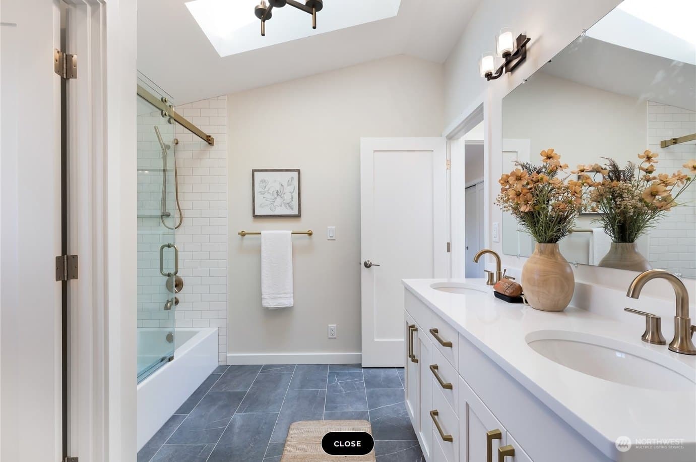 Accessible-height bathroom vanity and shower in a DIGS Construction accessory dwelling unit