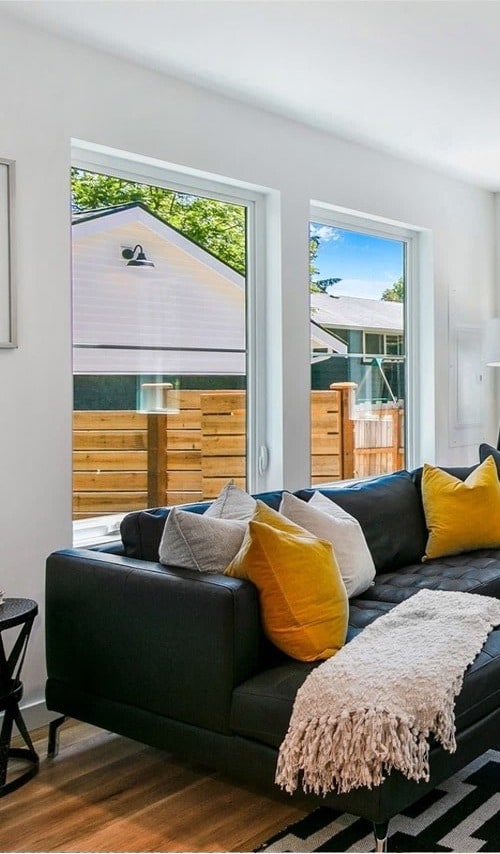 Small two-story backyard cottage DADU by DIGS Construction near Seattle — a permitted alternative to a tiny house