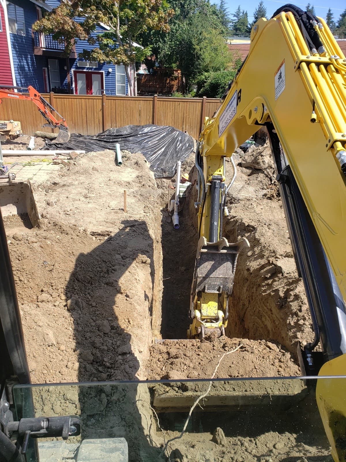 Utility trench and connections for an ADU, dug by DIGS Construction in the Seattle area
