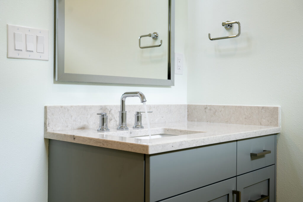 bathroom sink faucet towel rack light switch