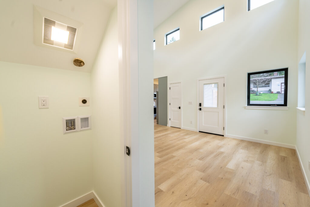 laundry room interior fan washer dryer hookups doorway