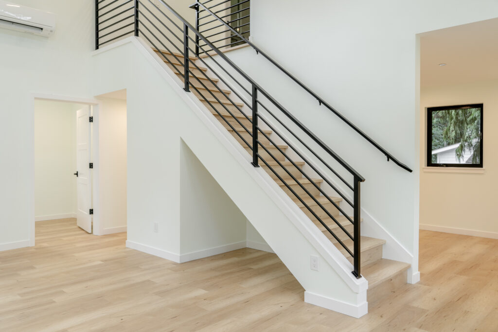 staircase painted metal railing handrail black upstairs